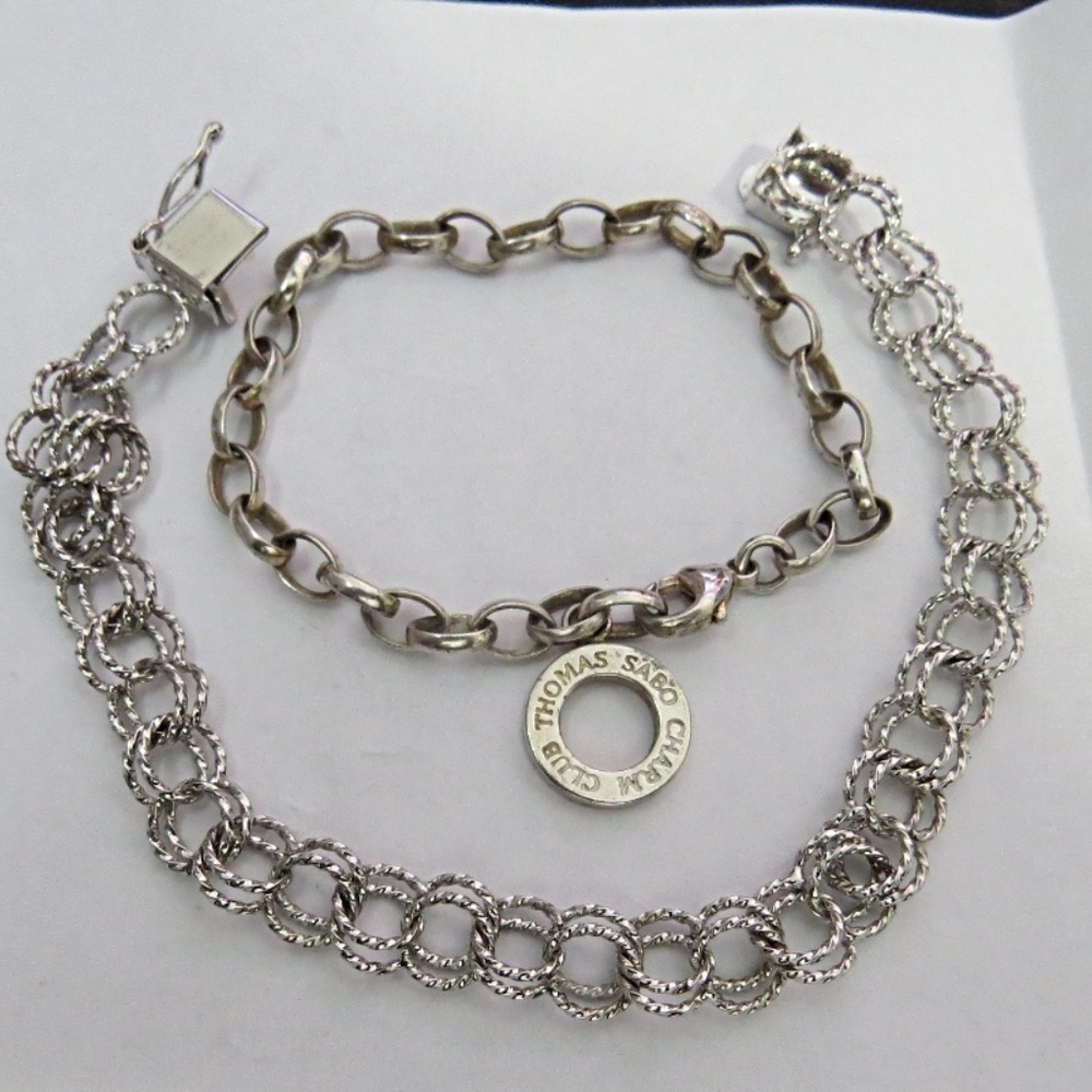 2 Sterling Silver Bracelets  1 Thomas Sabo (Small)  1 Charm Bracelet